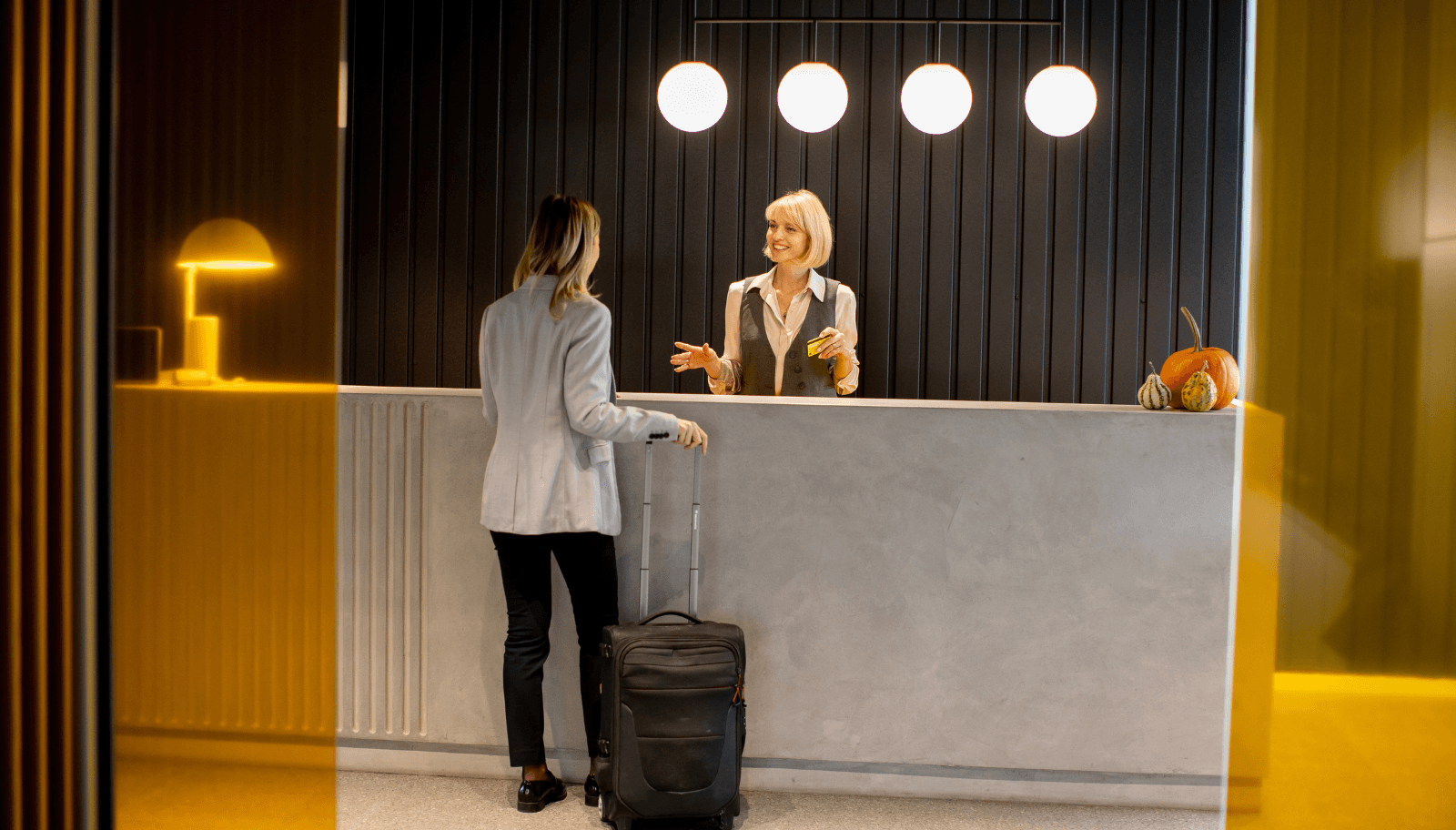Multilingual concierge assisting guests before, during, and after stays